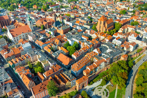 Obraz na płótnie Aerial panoramic view of historical buildings and roofs in Polish medieval town Torun w salonie