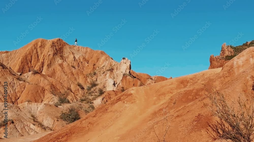 stunning desert landscape presents a breathtaking view of vibrant orange hills stunning desert landscape presents a breathtaking view of vibrant orange hills