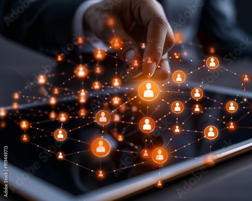 A hand interacts with a digital network of glowing icons on a tablet, representing social media and online connections.