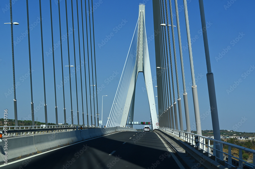 Fototapeta premium Modern cable bridge over the river in Portugal.
