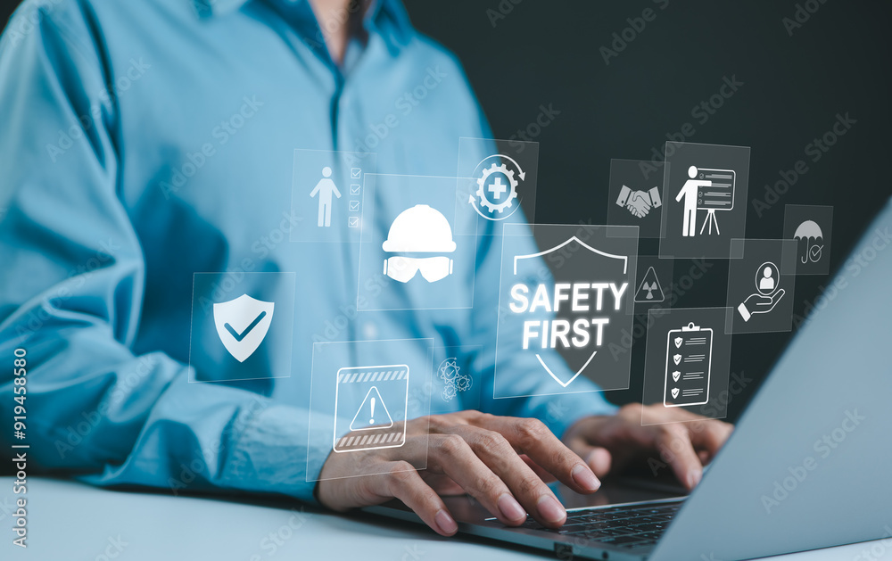 Safety Taskbar Images Safety First Concept. Work safety, Man typing on laptop with digital ...
