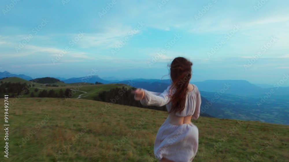 Woman Running in the Mountains at Sunset Woman Running in the Mountains at Sunset