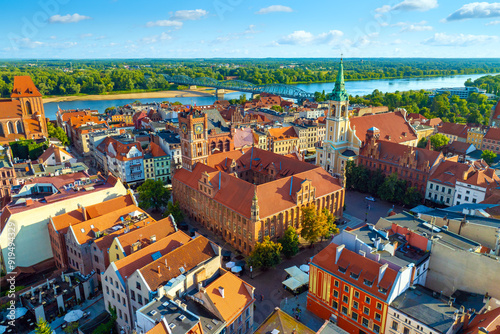 Obraz na płótnie Aerial panoramic view of historical buildings and roofs in Polish medieval town Torun w salonie