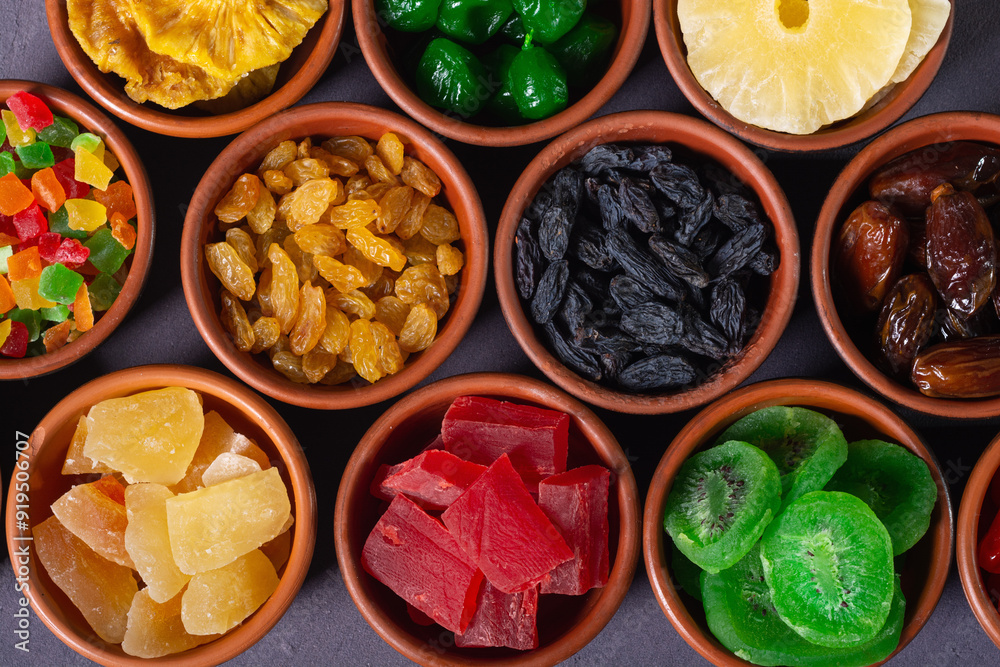 Group of dried and candied fruit in bowl Group of dried and candied fruit in bowl