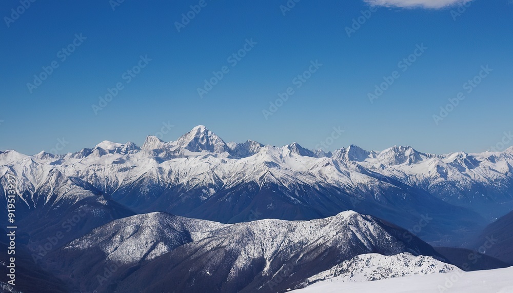 Fototapeta premium Majestic snowcapped mountains against a blue sky 8