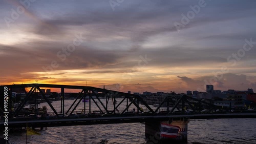 Time Lapse of Memorial Bridge at Sunset, Bangkok, Thailand photo