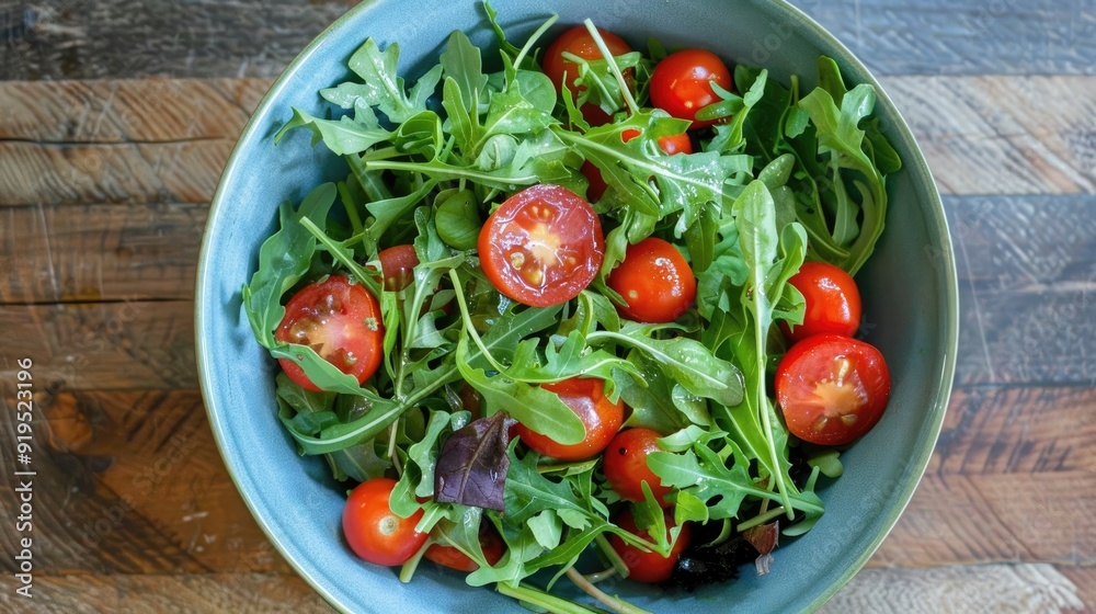 Mixed greens and cherry tomato salad in a bowl superfood keto vegan snack Mixed greens and cherry tomato salad in a bowl superfood keto vegan snack