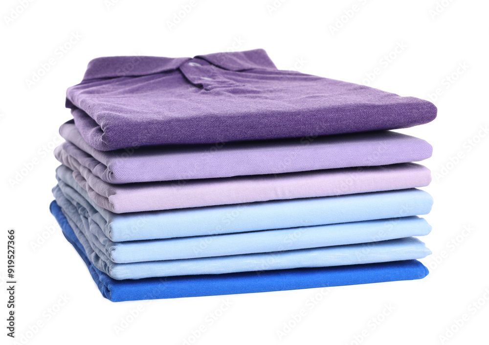 Stack of clean colorful t-shirts isolated on white Stack of clean colorful t-shirts isolated on white