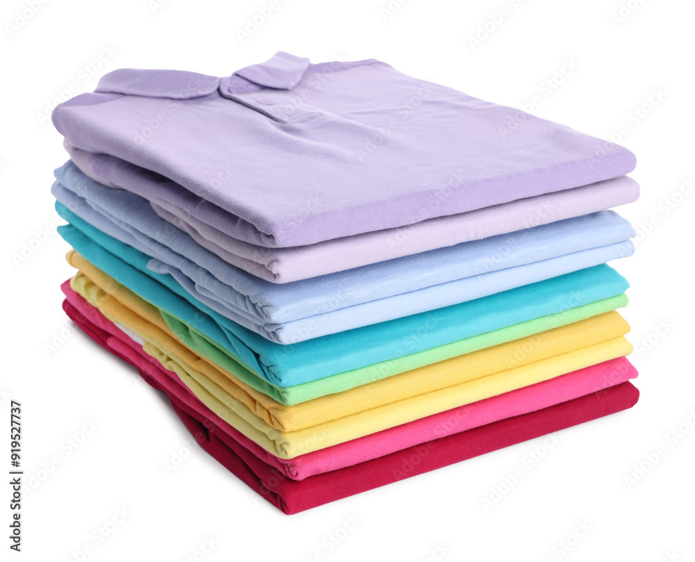 Stack of clean colorful t-shirts isolated on white Stack of clean colorful t-shirts isolated on white
