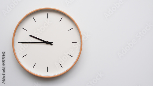 Wallpaper Mural Minimalist wooden Wall Clock on White Wooden Surface with Space for Text – Time Set at 21.45, 09.45 Torontodigital.ca