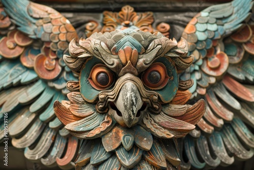 Ornate owl sculpture with intricate feather details and expressive eyes.