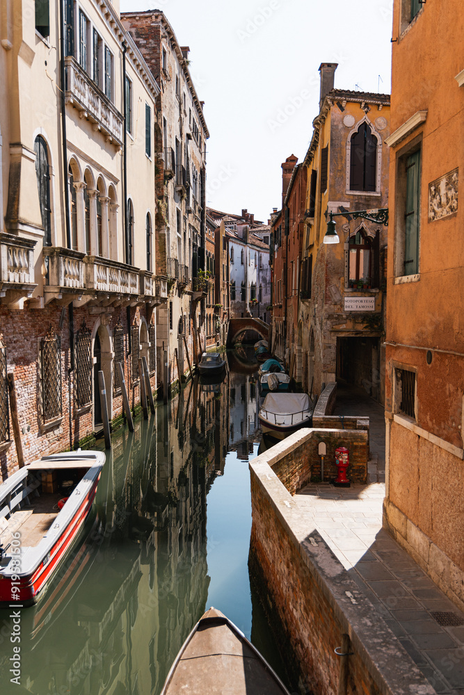 Fototapeta premium narrow canals of Venice. Architecture and landmark of Venice. Cozy cityscape of Venice.