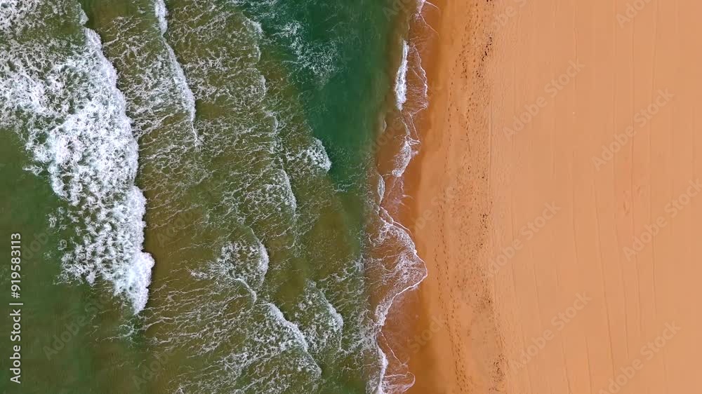 The beach displays a serene landscape with golden sands, calming waves. Italy The beach displays a serene landscape with golden sands, calming waves. Italy