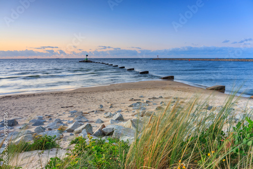 Fototapeta Naklejka Na Ścianę i Meble -  Sunset over the Baltic Sea beach in Gorki Zachodnie, Gdansk. Poland