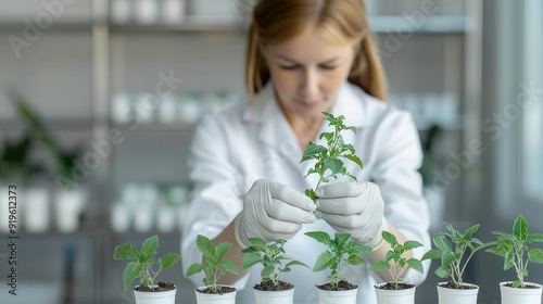 young caucasian woman researcher examining plant specimens at a table in a greenhouse lab, environmental science study, copy space