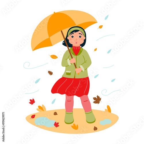 A surprised girl in autumn clothes hides under an umbrella from the wind and rain. Leaf fall. The autumn season.