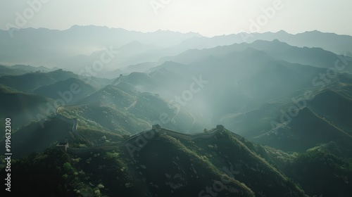The Great Wall as seen from a distance, stretching endlessly across the mountainous landscape,
