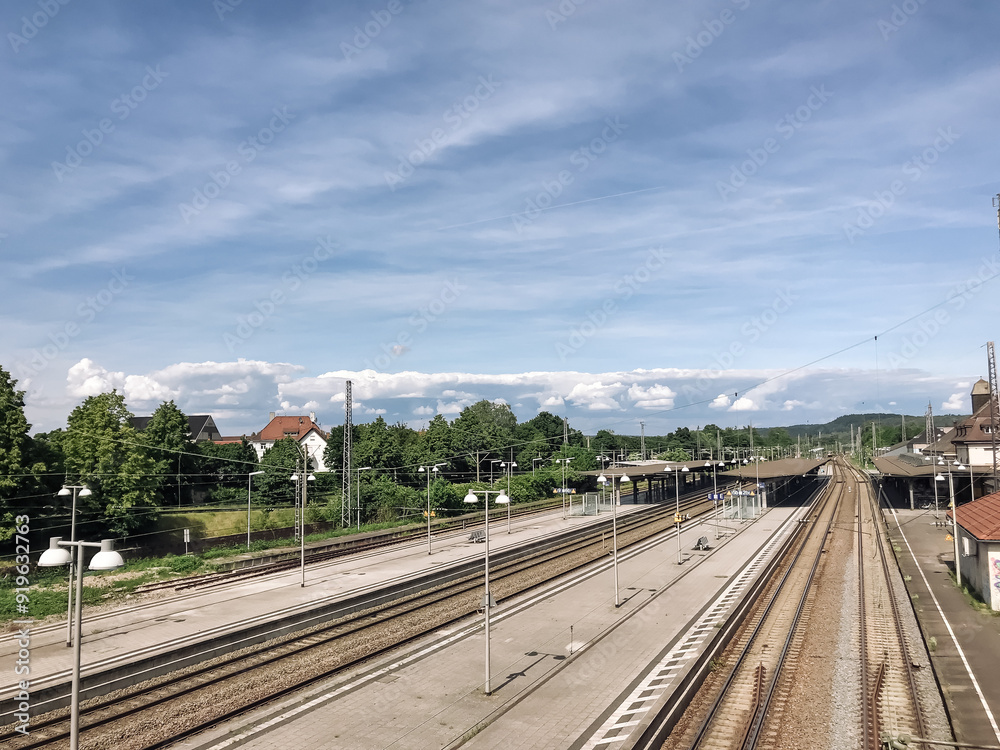 Fototapeta premium A train station with a clear blue sky above it