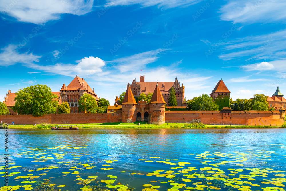 The Castle of the Teutonic Order in Malbork by the Nogat river. Poland