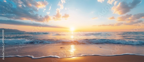  The sun sets over the foamy ocean, waves crash onto the sand photo