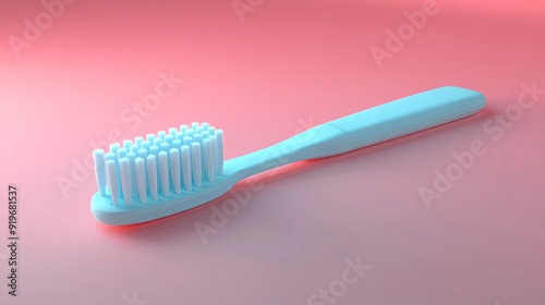 A blue toothbrush on a pink surface.