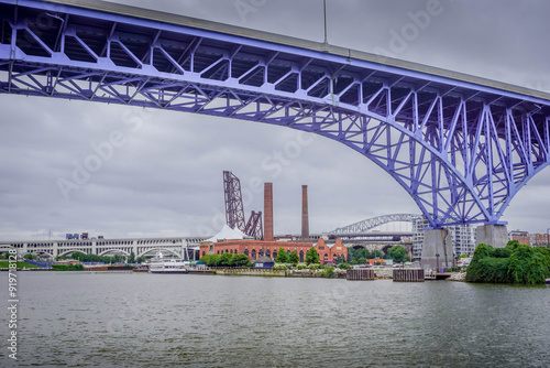 The Cuyahoga river waterfront and the stadium under Main Avenue Bridge (Cleveland Memorial Shoreway) at Ohio, USA.
