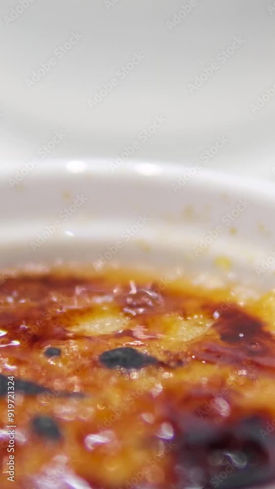 Vanilla cream with burnt sugar on top, dessert. Creme brulee in Catalan style Vanilla cream with burnt sugar on top, dessert. Creme brulee in Catalan style