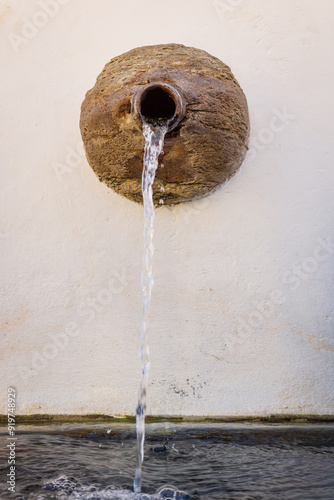 Water at Chafariz do Kaquende fountain in Sabará, Minas Gerais, Brazil. photo