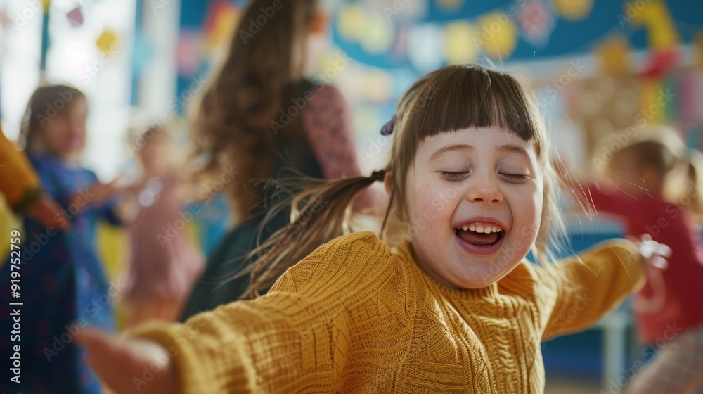 Cute little girl dancing happily at nursery school Cute little girl dancing happily at nursery school