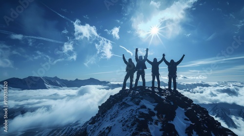Group of men standing on mountain top celebrating success