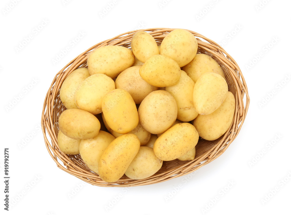 Young potatoes in wicker basket isolated on white, top view Young potatoes in wicker basket isolated on white, top view