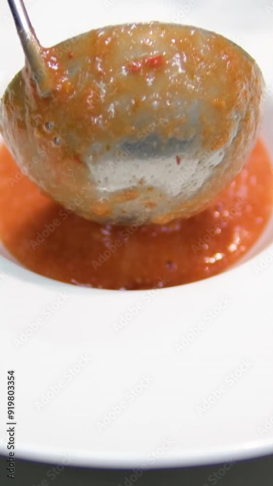Tomato gazpacho Spanish cold soup with pepper and garlic, Spanish traditional cuisine, chef cooking dinner. Step by step cooking process Tomato gazpacho Spanish cold soup with pepper and garlic, Spanish traditional cuisine, chef cooking dinner. Step by step cooking process