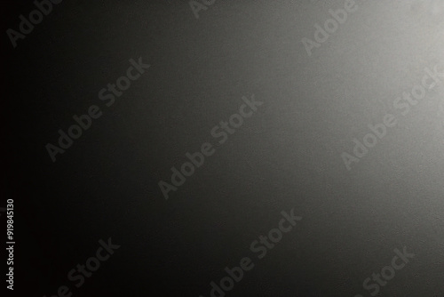 Black foil gradient texture background with uneven surface