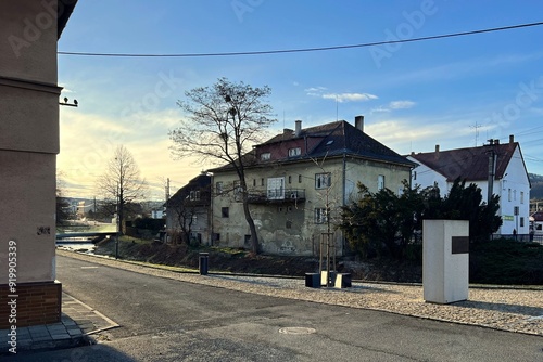 Center of Palkovice village with an old house photo