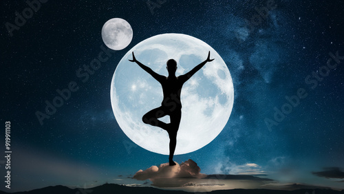 A silhouette of a person practicing yoga in front of a large full moon, symbolizing balance, strength, and cosmic connection, set against a starry night sky.