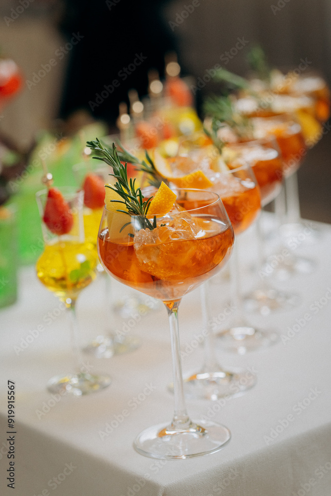 Welcome drink with cocktail glasses and drinks at an event. Alcoholic beverages at a wedding Welcome drink with cocktail glasses and drinks at an event. Alcoholic beverages at a wedding