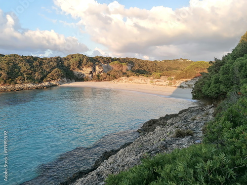 Lonely paradisiac beach Petit Sperone early in the morning, Corse. No people photo