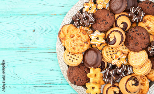 Mix of cookies . Many unhealthy snacks . Top view photo