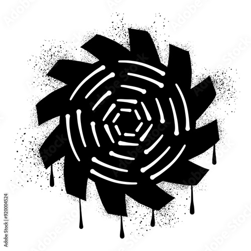 Circular saw with black spray paint graffiti