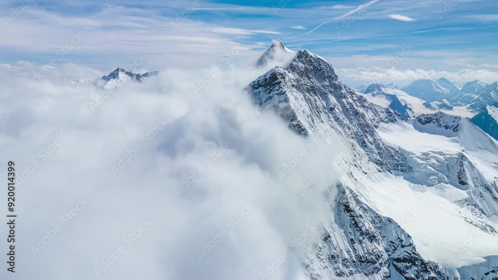 Aerial hyperlapse of Jungfrau at on a snowy day Aerial hyperlapse of Jungfrau at on a snowy day
