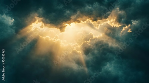 Golden Rays of Light Through Dark Clouds - Dramatic Sky Photo