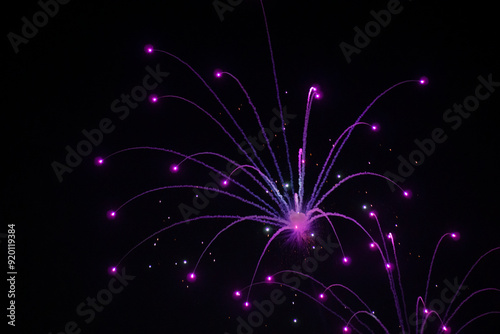 Fireworks on the dark sky background. Colorful fireworks from Loto Quebec in Quebec, Canada. Abstract colored firework background with free space for text. fireworks light up the night sky