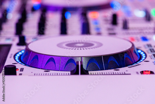 Dee Jay turn table music mixer extreme close up purple