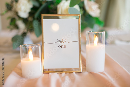 White sign in gorgeous gold frame that reads 