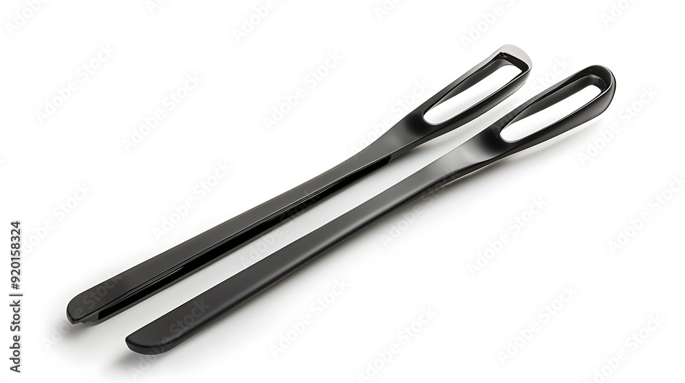 Black Plastic Tongs on a White Background Black Plastic Tongs on a White Background