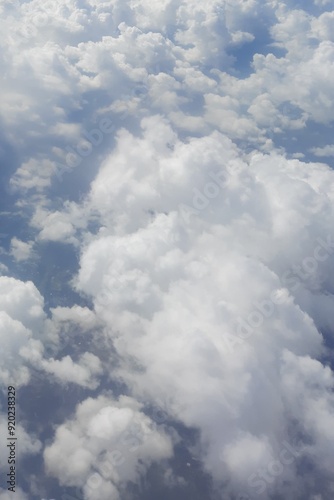 Beautiful view blue sky and white clouds from the airplane | Window seat passenger view 