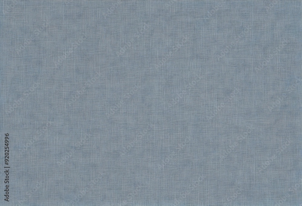 Faded blue linen texture gray background featuring a distressed look with visible fibers Faded blue linen texture gray background featuring a distressed look with visible fibers