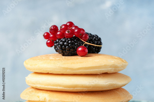 Sweet pancakes with fresh b...