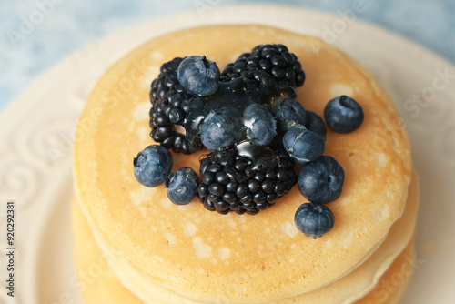 Plate of sweet pancakes wit...