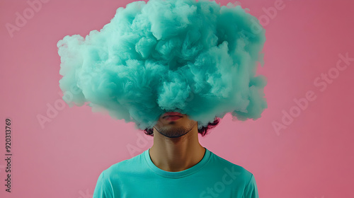 A person with a cloud of teal smoke obscuring their head against a pink background.